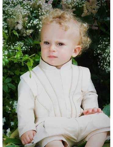 girl in christening bonnet and baptismal dress