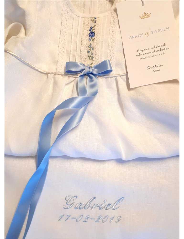 christening gown with unique lace and ceris bow