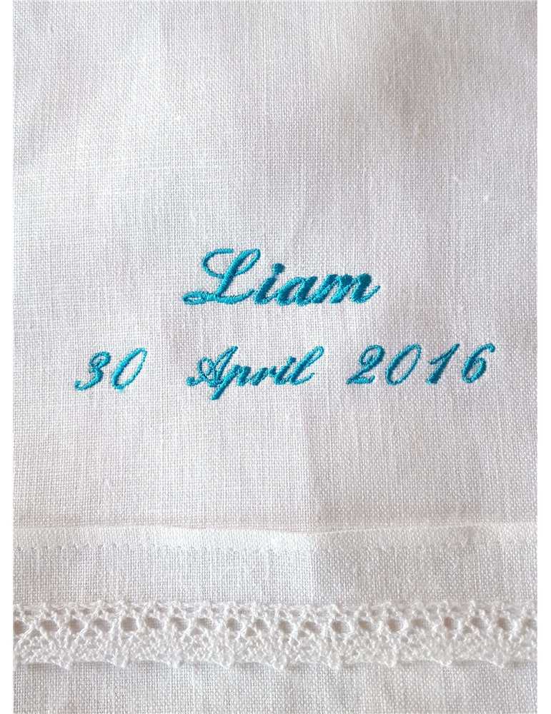 mother with baby in baptismal gown